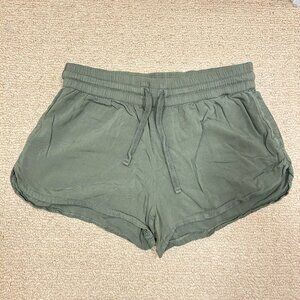 Aritzia TNA elastic waist shorts green